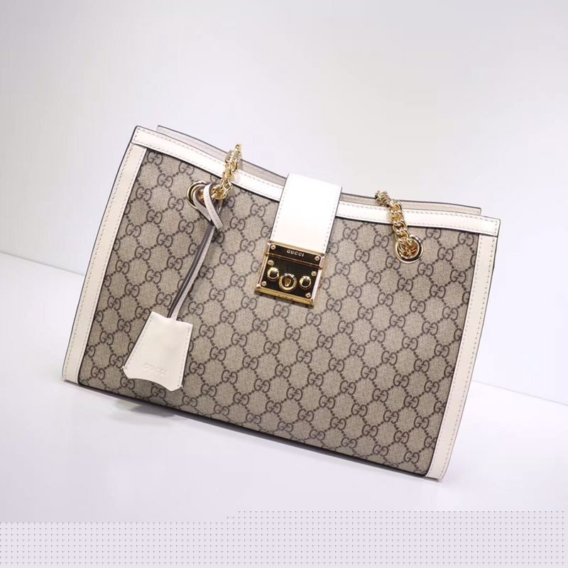 G*u*i shopping bags
